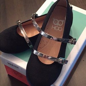 Adorable new black Mary janes with silver straps.